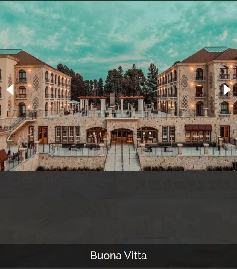 Buona Vitta Gramado Resort & Spa By Gramado Parks 외부 사진 The photo shows a spacious and elegant building design, likely a hotel or resort. The structure features multiple stories and large windows, with outdoor seating areas visible on a terrace or patio. The exterior has a combination of stone and modern 